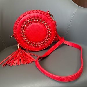 Red tassel braided woven circle crossbody bag gold hardware
